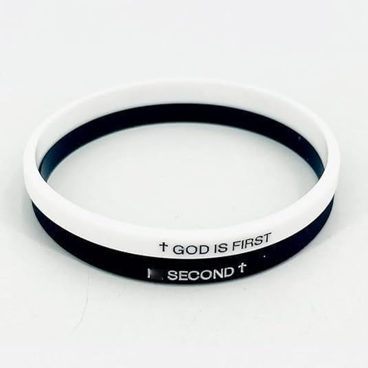 White wristband with black text 'GOD IS FIRST' and 'SECOND' on a white background